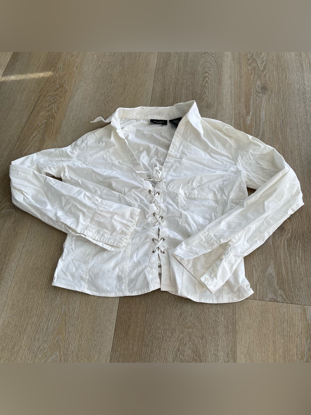 vintage Y2K-style white lace-up stretch blouse